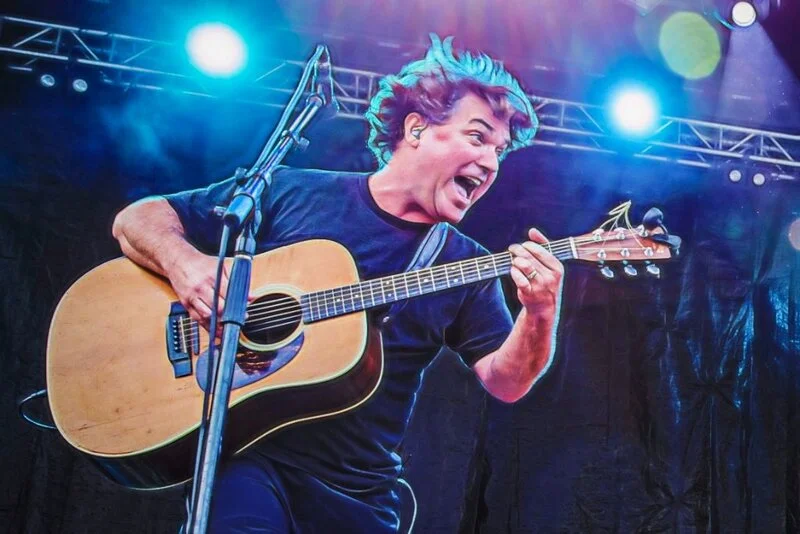 Keller Williams performing on stage